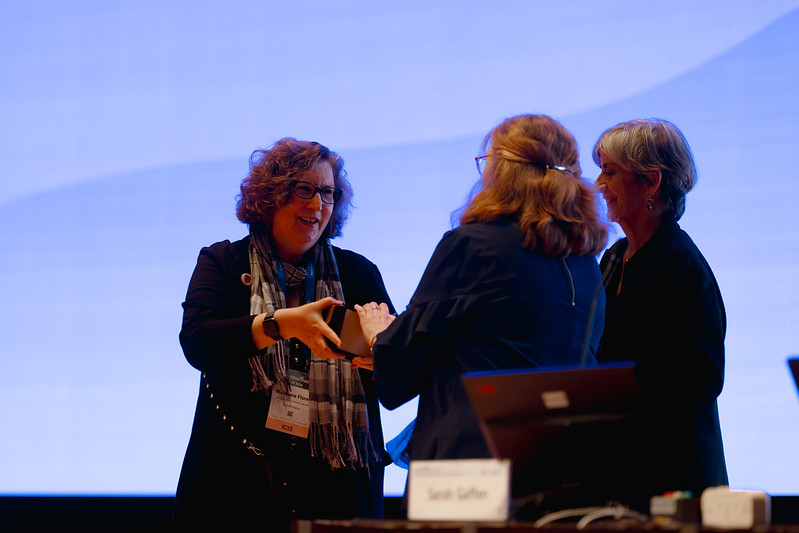 Incoming Managing Director, Stephanie Flores (L), President Sarah Gaffen (M) and retiring Managing Director, Joan Oefner (R ) at Cytokines 2024 in Seoul.